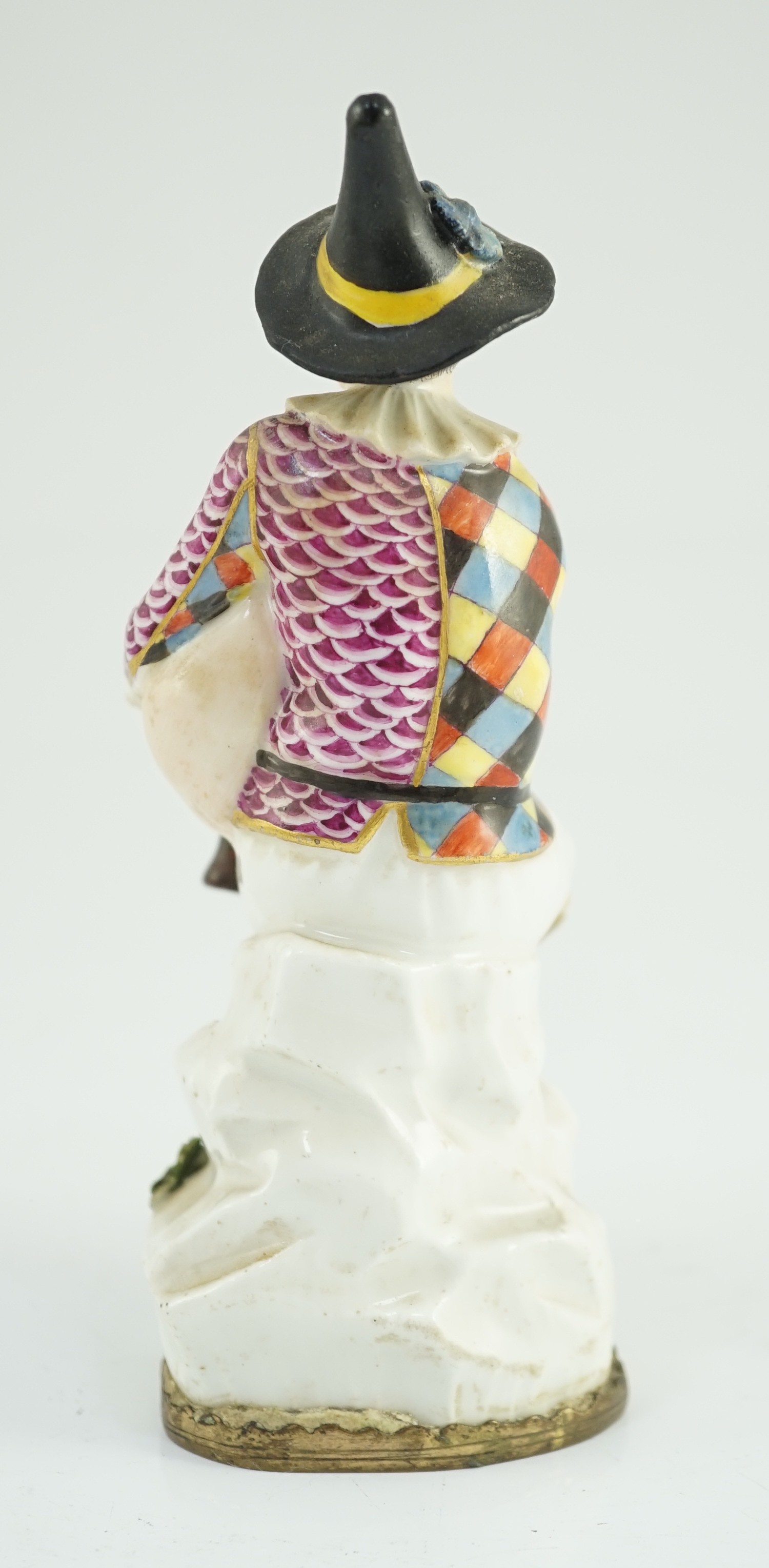 A Meissen porcelain figure of a seated bagpiper, mid 18th century, modelled by J.J. Kandler, 15cm high, restored, Provenance - purchased from Winifred Williams, Eastbourne/London before 1970.